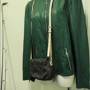 Green leather jacket. Absolutely a fantastic jacket.  Great quality.